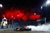 ABU DHABI, UNITED ARAB EMIRATES - NOVEMBER 26: Race winner Max Verstappen of the Netherlands driving the (1) Oracle Red Bull Racing RB19 performs donuts on track during the F1 Grand Prix of Abu Dhabi at Yas Marina Circuit on November 26, 2023 in Abu Dhabi, United Arab Emirates. (Photo by Mark Thompson/Getty Images) // Getty Images / Red Bull Content Pool // SI202311260254 // Usage for editorial use only //